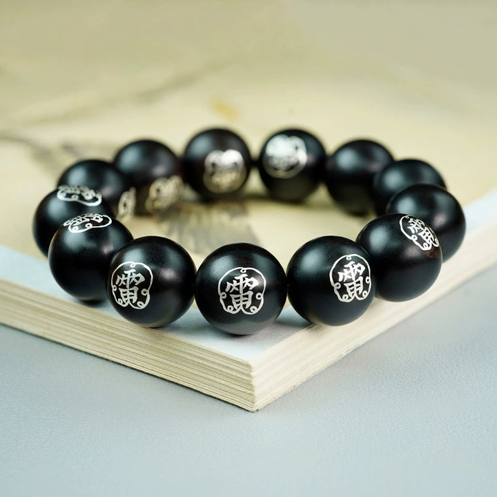 taoist-thunder-symbol-protection-wooden-bead-bracelet-with-silver-inlay-daozeno-01