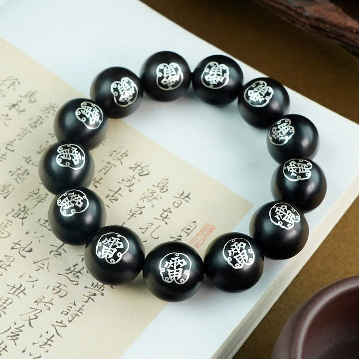 taoist-thunder-symbol-protection-wooden-bead-bracelet-with-silver-inlay-daozeno-02