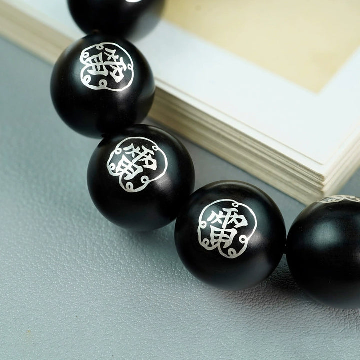 taoist-thunder-symbol-protection-wooden-bead-bracelet-with-silver-inlay-daozeno-03